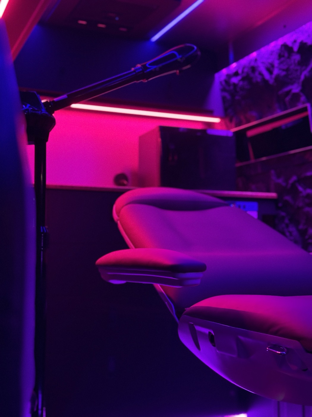 Reclined treatment chair beside the magnifying lamp